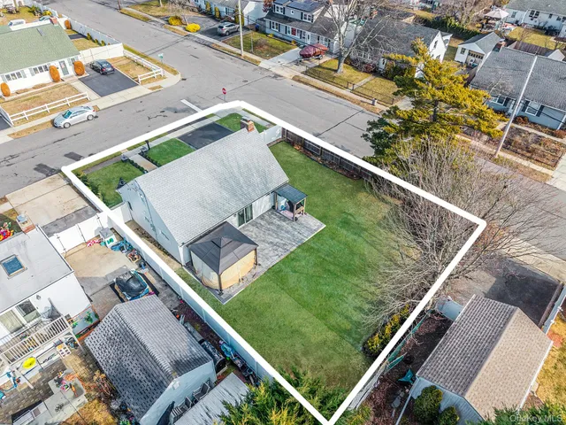 a view of a balcony with two chairs