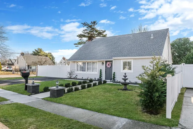 a aerial view of a house with a garden and plants