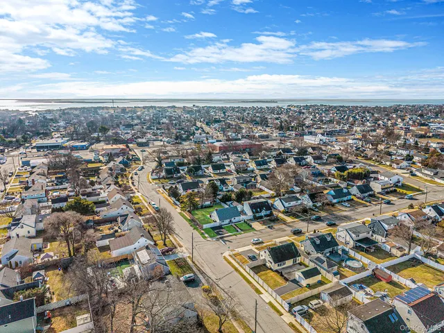 an aerial view of a city with lots of residential buildings