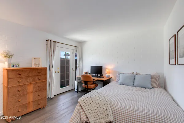 a kitchen with stainless steel appliances granite countertop a stove and a refrigerator