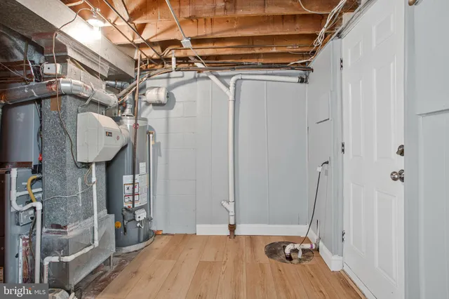 a view of a room with wooden walls