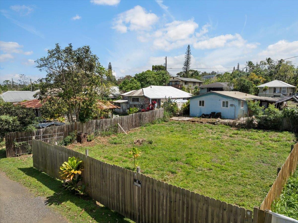 956 Kahealani Street Haiku, HI 96708 - Photo 13 of 27 a view of a house with backyard and sitting area