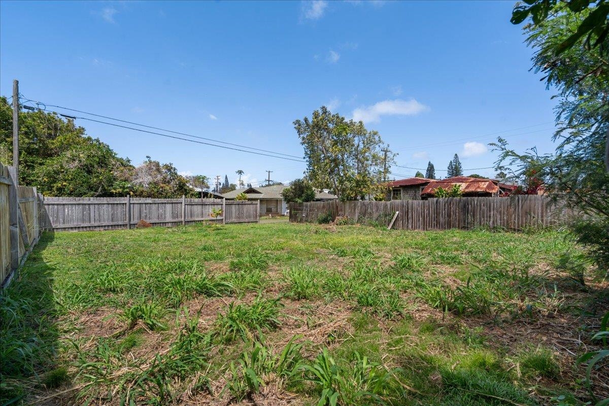 956 Kahealani Street Haiku, HI 96708 - Photo 22 of 27 a view of yard with green space and trees in the background