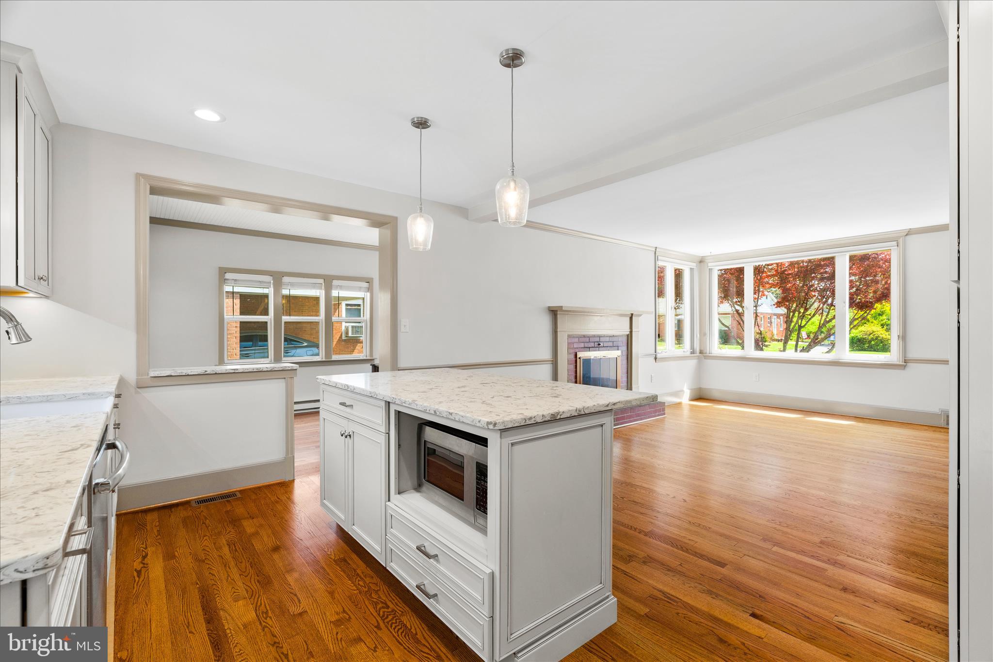 417 Biggs Avenue Frederick, MD 21702 - Photo 11 of 57 a kitchen that has a stove and a wooden floor