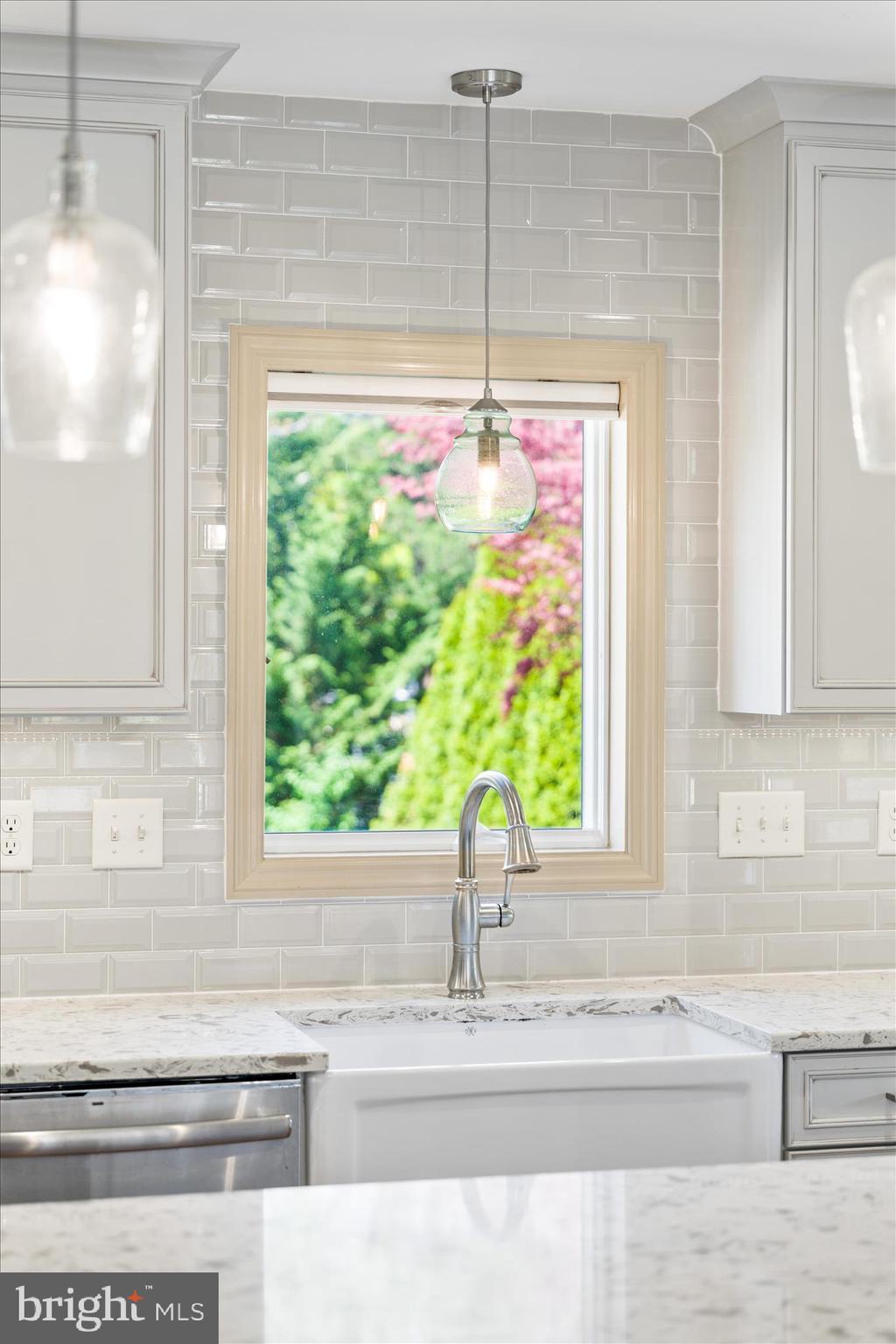417 Biggs Avenue Frederick, MD 21702 - Photo 14 of 57 a bathroom with a granite countertop sink and a window
