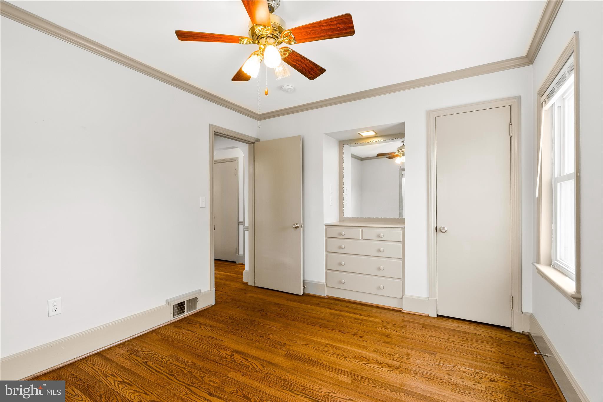 417 Biggs Avenue Frederick, MD 21702 - Photo 26 of 57 wooden floor in an empty room