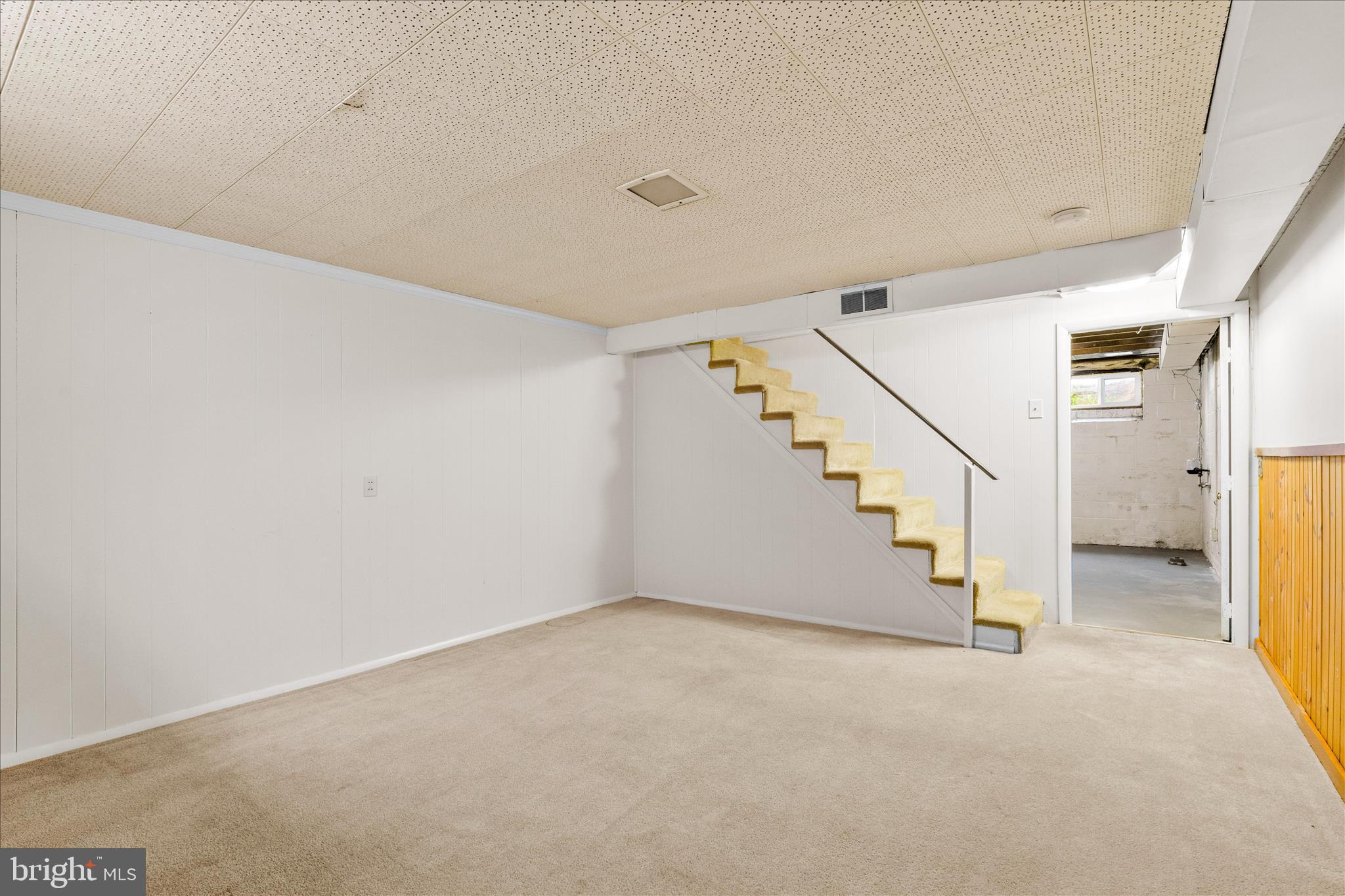 417 Biggs Avenue Frederick, MD 21702 - Photo 35 of 57 a view of an empty room with stairs