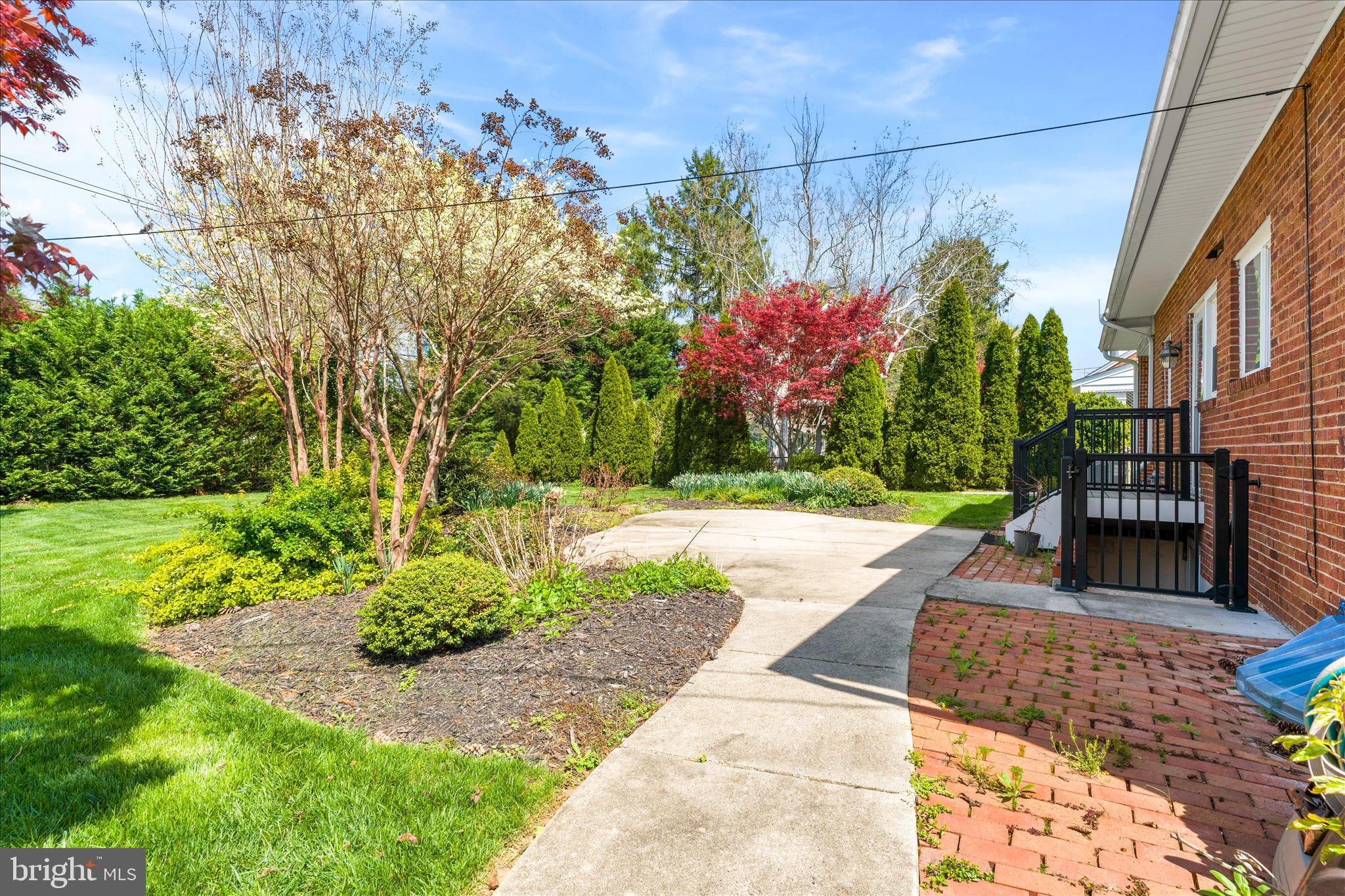 417 Biggs Avenue Frederick, MD 21702 - Photo 46 of 57 a view of a pathway of a house with a yard