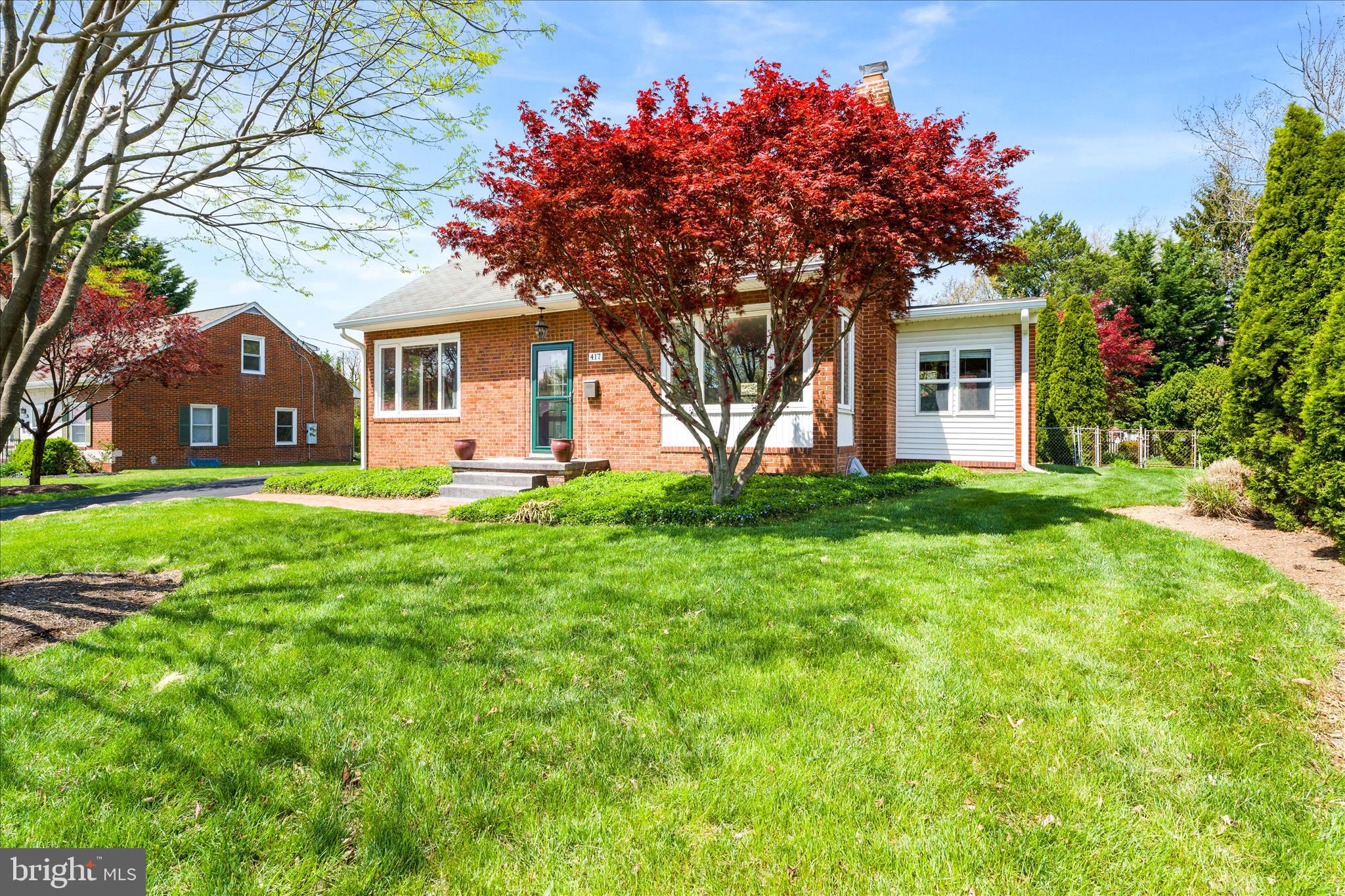 417 Biggs Avenue Frederick, MD 21702 - Photo 57 of 57 a front view of house with yard and trees