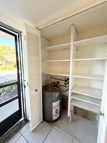 a view of storage and utility room