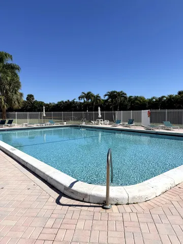 a view of a lake with a yard