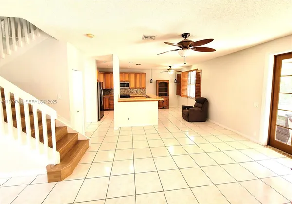 a view of a hallway with staircase