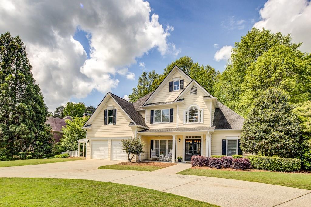 2175 Eagle Trace Cumming, GA 30040 - Photo 1 of 1 a front view of a house with a yard
