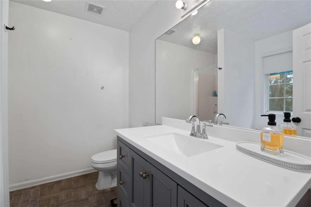 336 Shenandoah Circle Winder, GA 30680 - Photo 24 of 41 a bathroom with a sink toilet and shower
