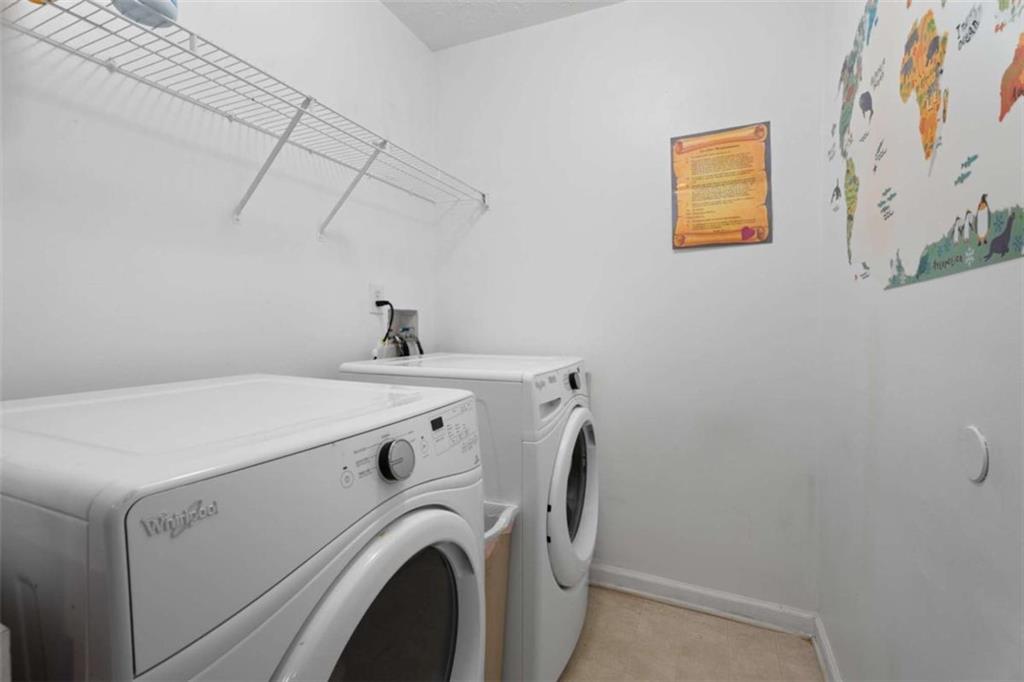 336 Shenandoah Circle Winder, GA 30680 - Photo 28 of 41 a utility room with dryer and washer