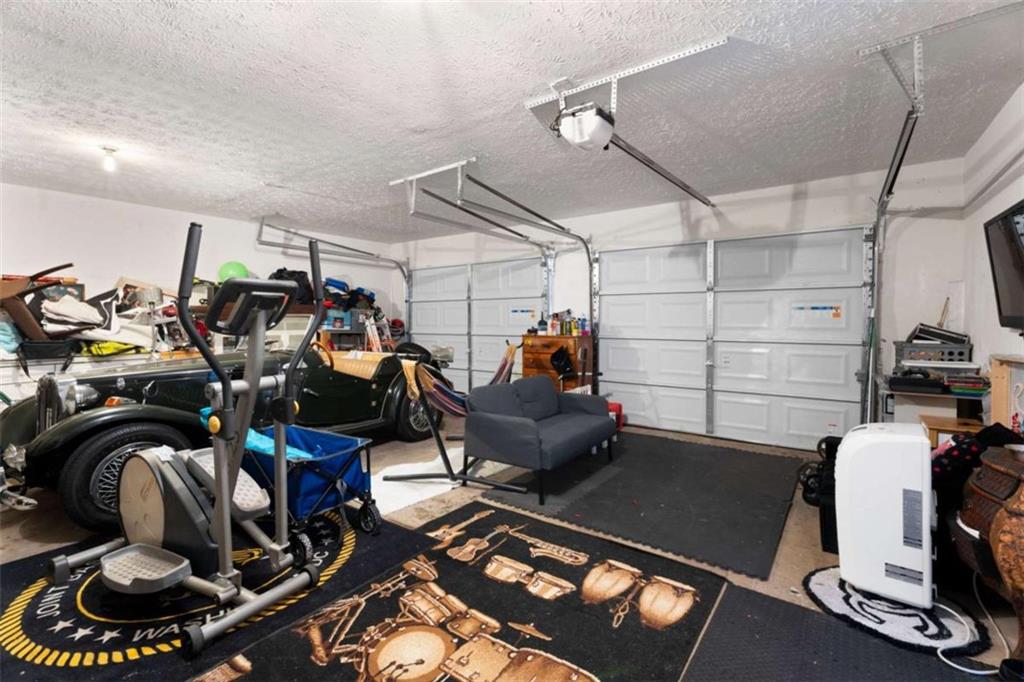 336 Shenandoah Circle Winder, GA 30680 - Photo 32 of 41 a view of a room with gym equipment