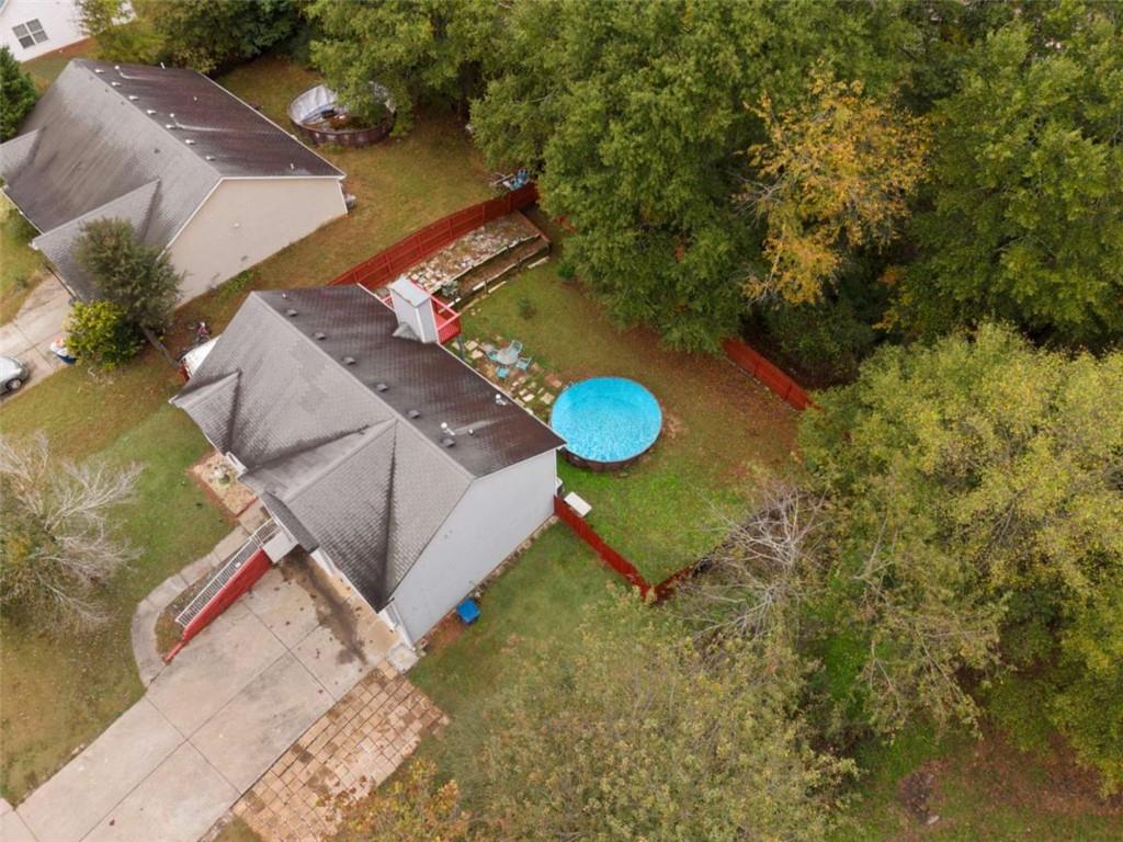336 Shenandoah Circle Winder, GA 30680 - Photo 38 of 41 a aerial view of a house with a yard and fence