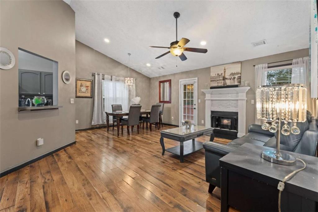 336 Shenandoah Circle Winder, GA 30680 - Photo 6 of 41 a living room with furniture and a fireplace
