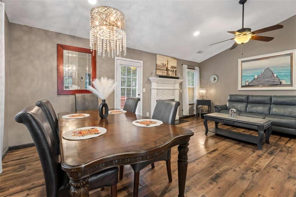 336 Shenandoah Circle Winder, GA 30680 - Photo 8 of 41 a view of a dining room with furniture window and wooden floor