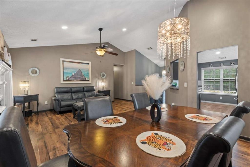 336 Shenandoah Circle Winder, GA 30680 - Photo 9 of 41 a living room with furniture and a chandelier