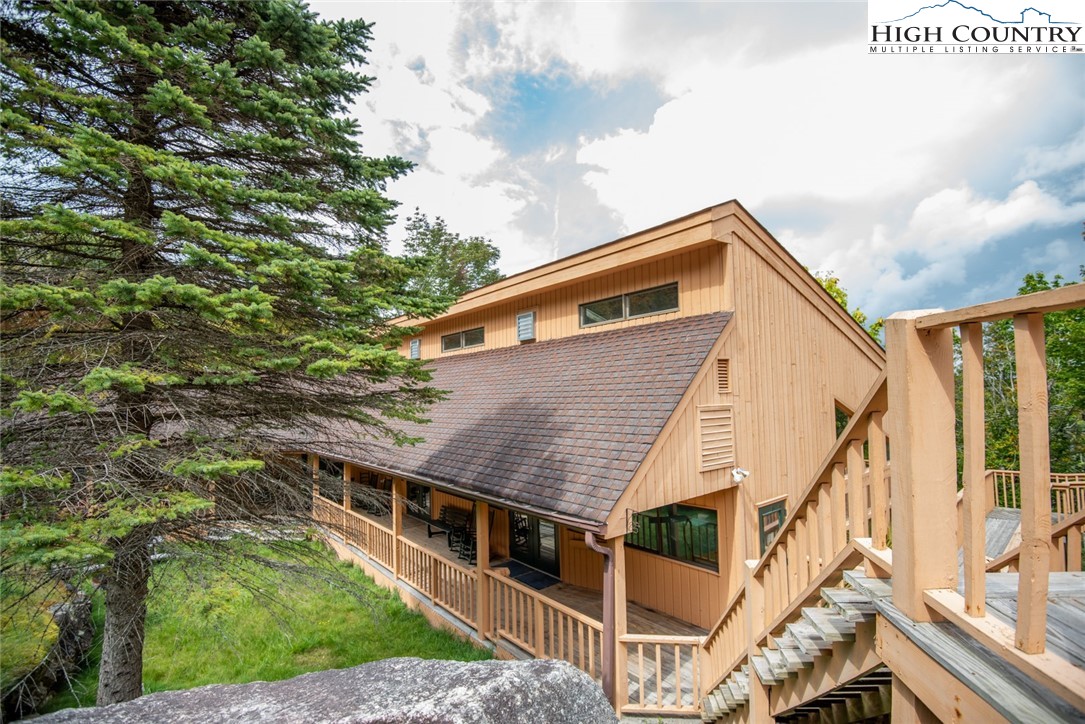 220 Charter Hills Road, Unit A2 Beech Mountain, NC 28604 - Photo 28 of 30 a view of house with backyard and deck