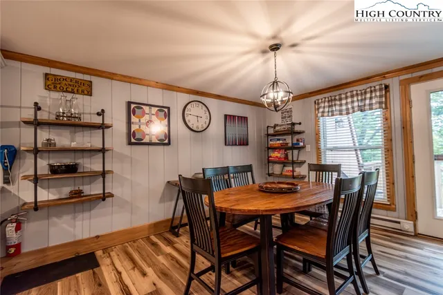 a bathroom with a toilet a sink and a mirror