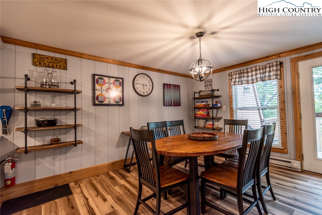 220 Charter Hills Road, Unit A2 Beech Mountain, NC 28604 - Photo 8 of 30 a dining room with furniture and window