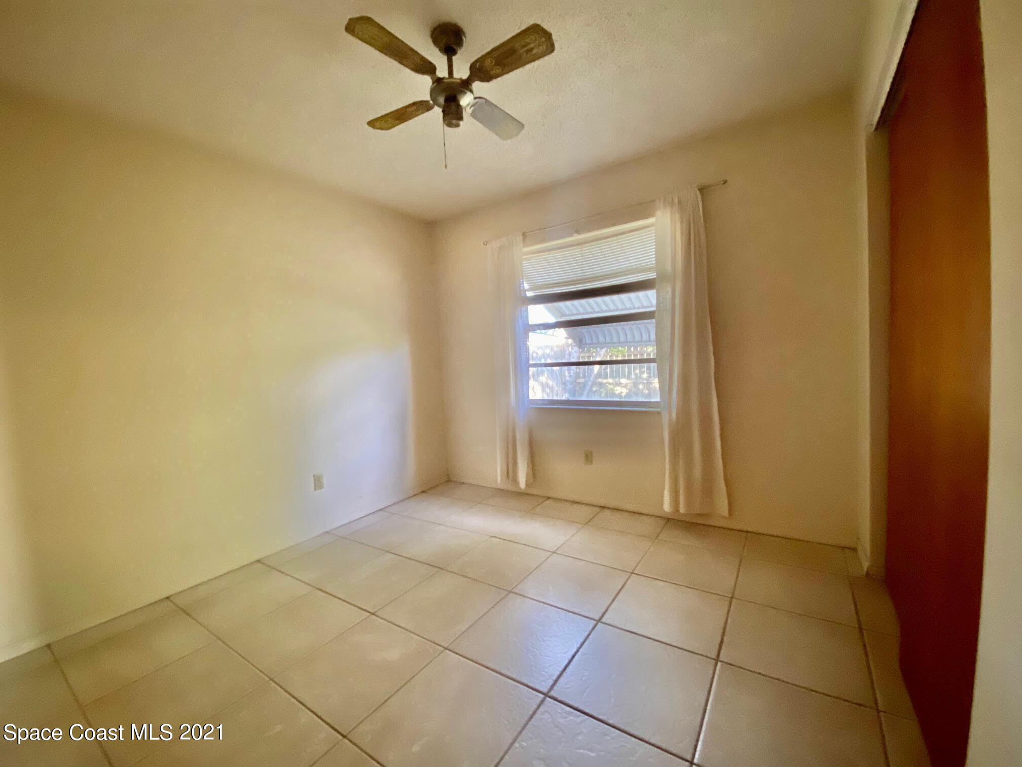 2933 Lancaster Road Melbourne, FL 32935 - Photo 22 of 25 a view of a livingroom with a fireplace