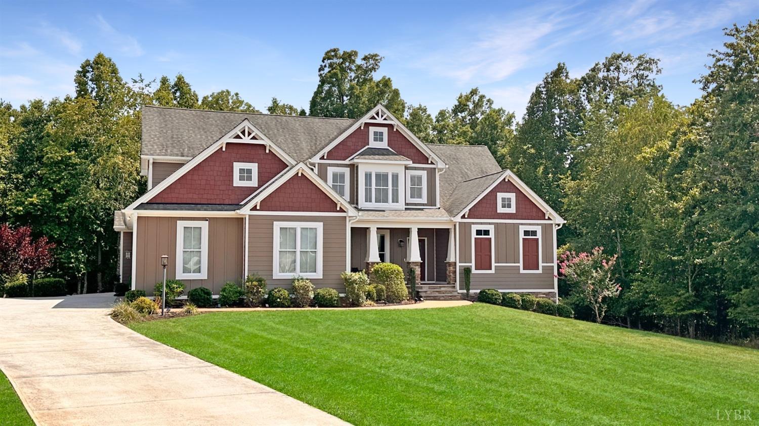 1011 Revelry Point Forest, VA 24551 - Photo 1 of 90 a front view of a house with a yard