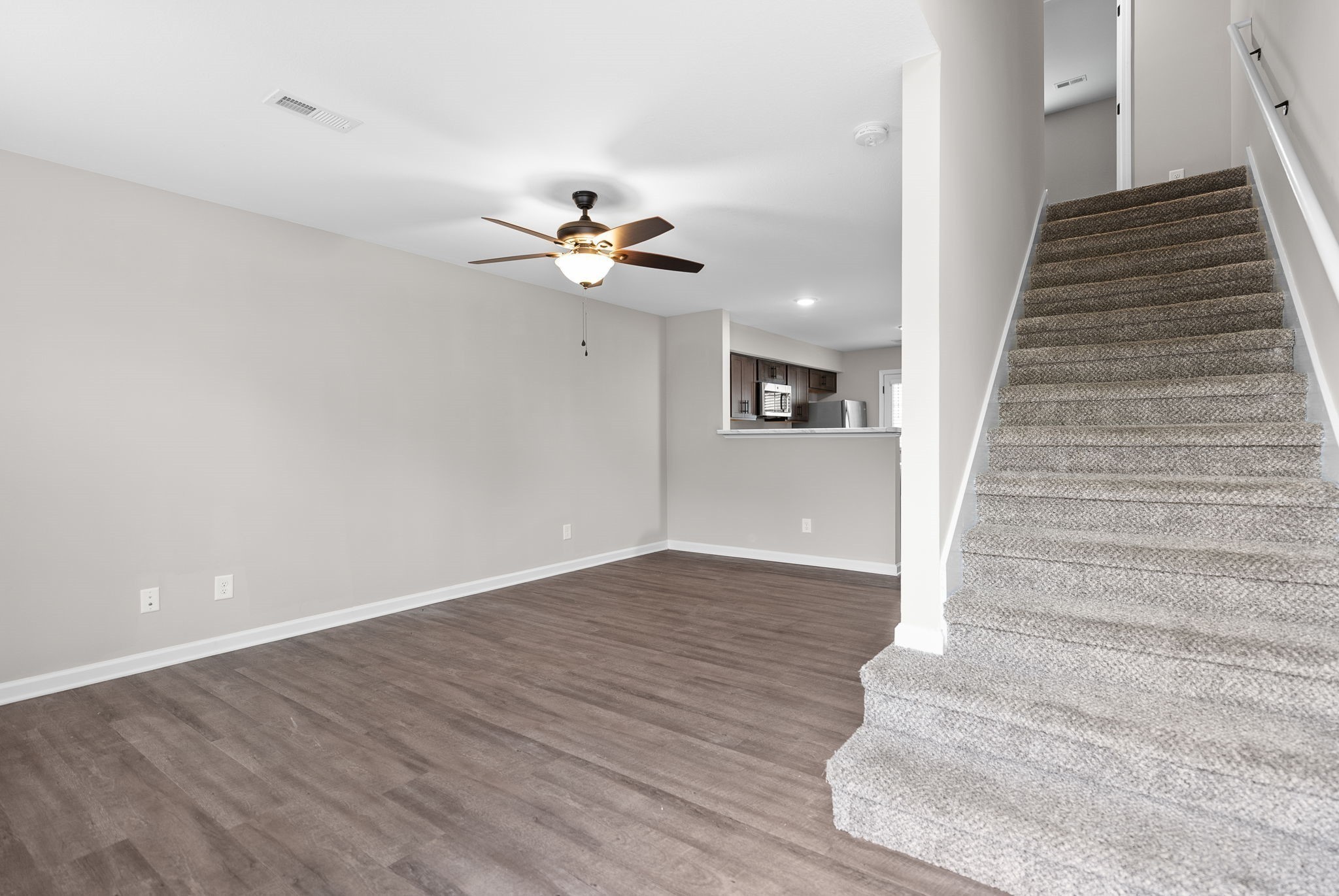 418 Peachers Mill Road, Unit C6 Clarksville, TN 37042 - Photo 2 of 21 wooden floor in an empty room with a window
