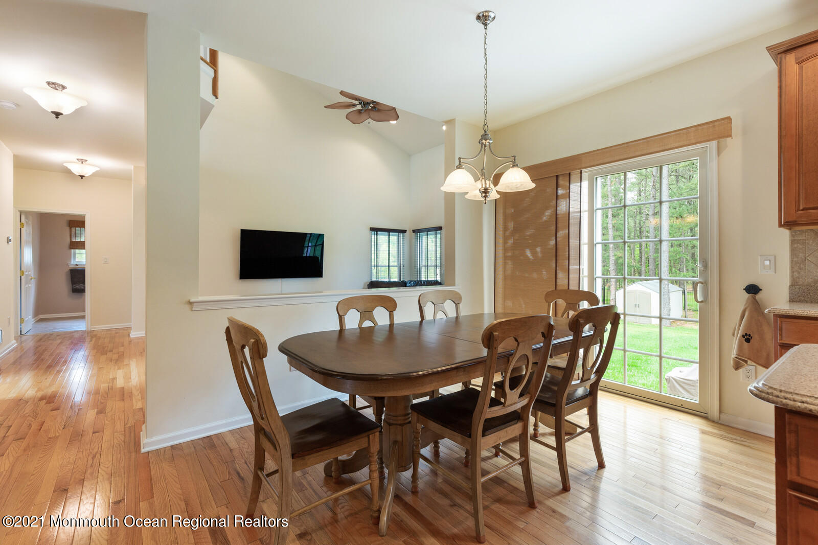 124 Adams Way Jackson, NJ 08527 - Photo 22 of 62 a dining room with furniture window and wooden floor