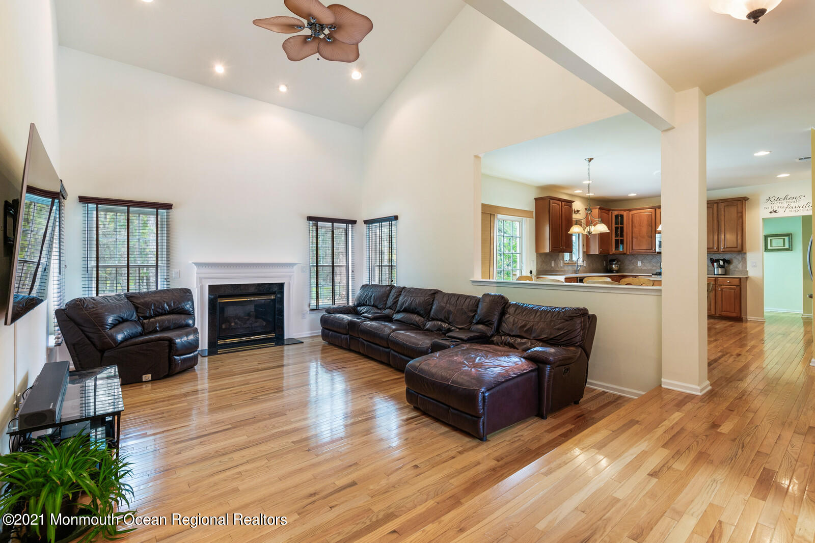 124 Adams Way Jackson, NJ 08527 - Photo 25 of 62 a living room with furniture and a fireplace