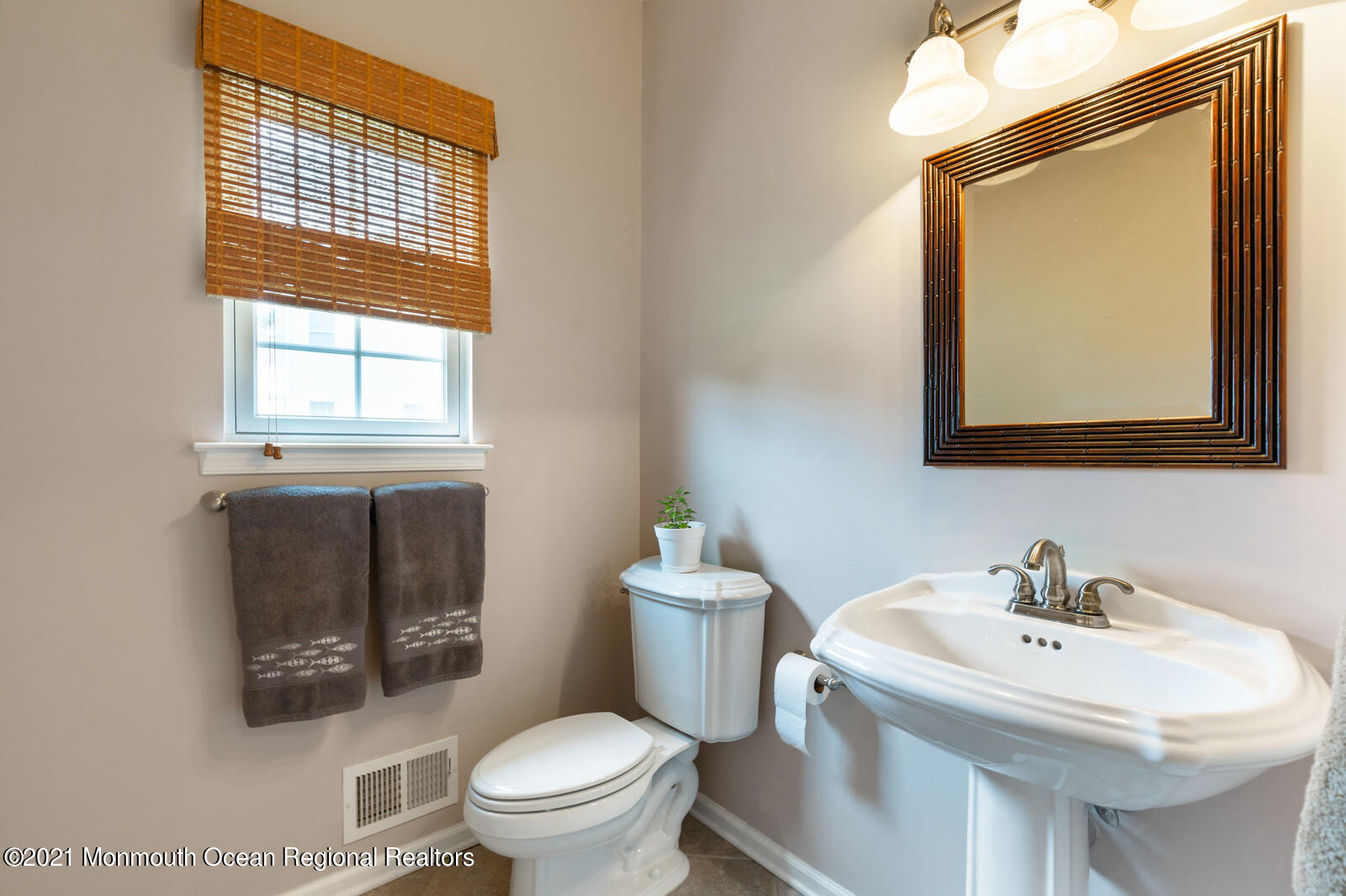 124 Adams Way Jackson, NJ 08527 - Photo 28 of 62 a bathroom with a sink a toilet and a mirror