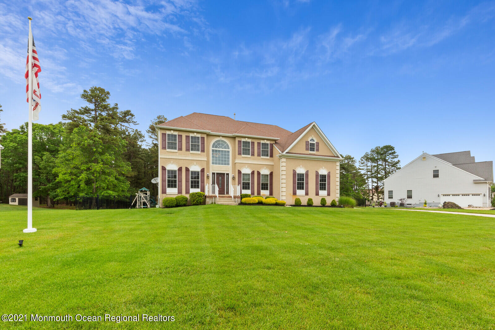 124 Adams Way Jackson, NJ 08527 - Photo 4 of 62 a view of a house with a big yard and large trees