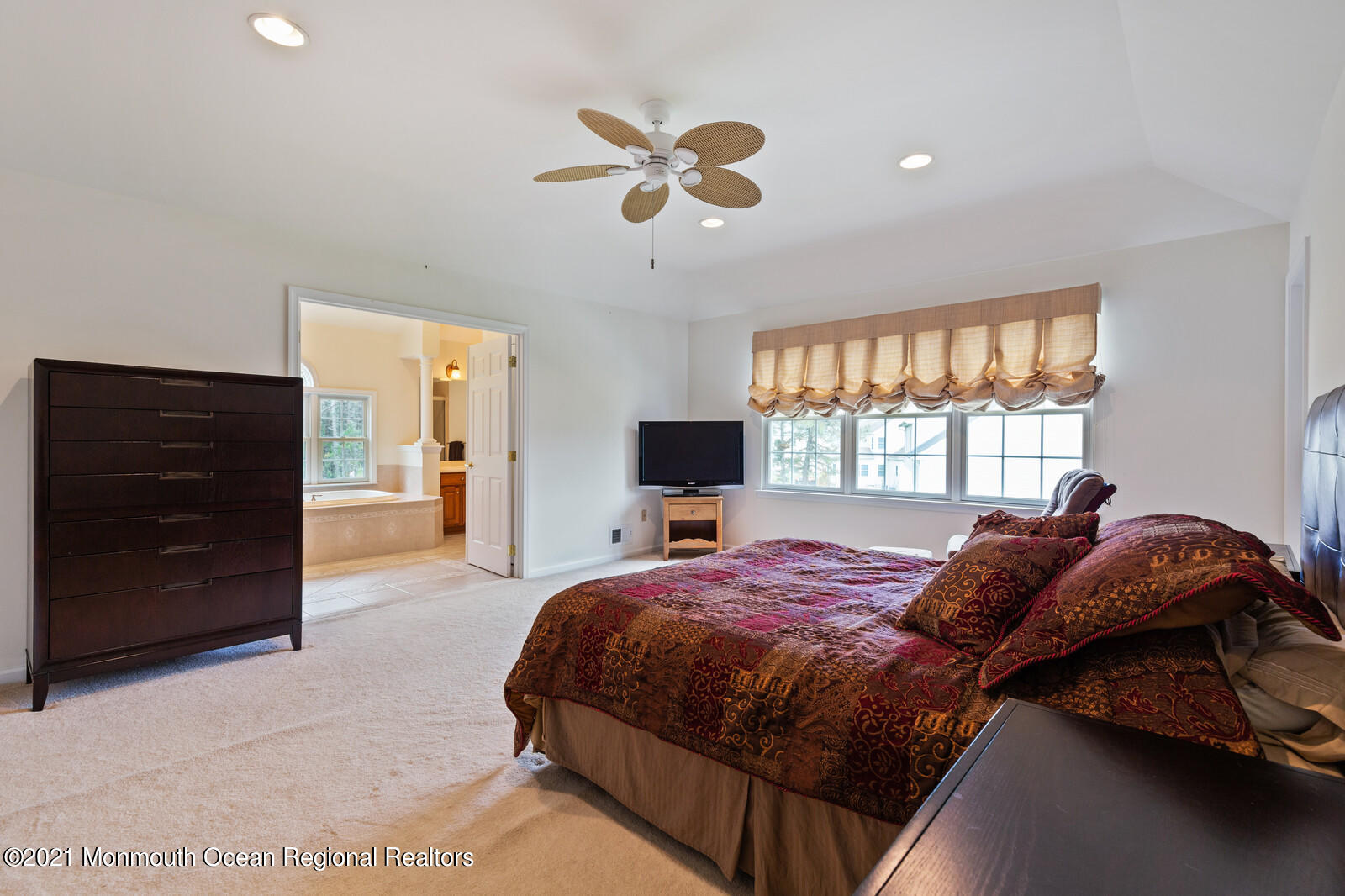 124 Adams Way Jackson, NJ 08527 - Photo 33 of 62 a bedroom with a bed and a dresser with a window