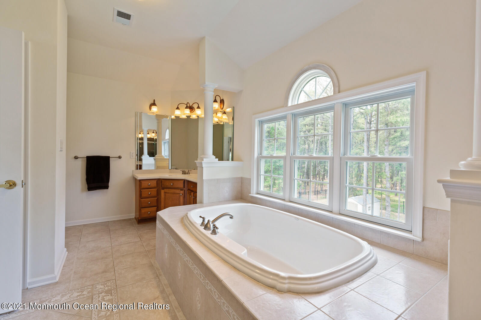 124 Adams Way Jackson, NJ 08527 - Photo 36 of 62 a bathroom with a tub and a large window