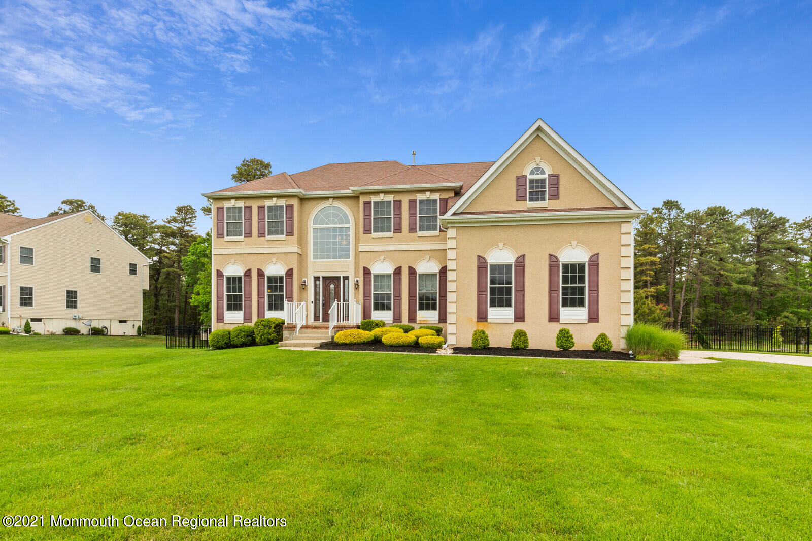 124 Adams Way Jackson, NJ 08527 - Photo 5 of 62 a front view of a house with a yard