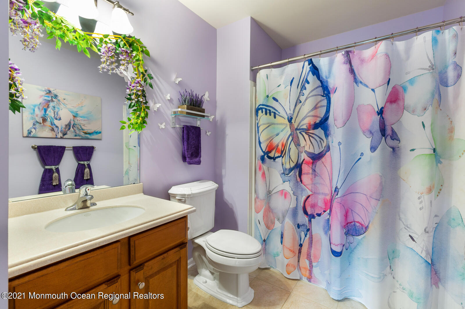 124 Adams Way Jackson, NJ 08527 - Photo 41 of 62 a bathroom with a sink and a mirror