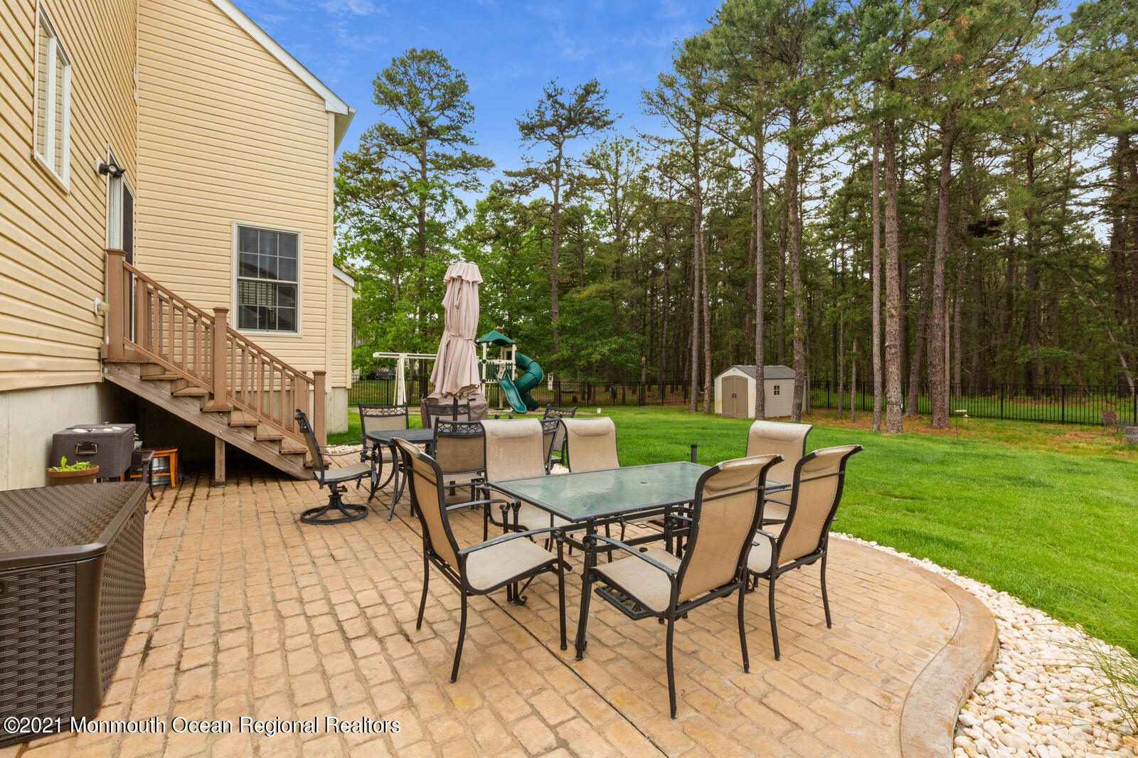 124 Adams Way Jackson, NJ 08527 - Photo 46 of 62 a view of a chairs and table in the patio