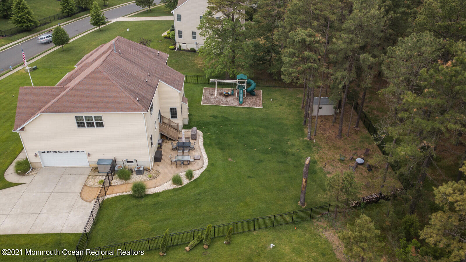 124 Adams Way Jackson, NJ 08527 - Photo 59 of 62 an aerial view of a house with garden space and street view