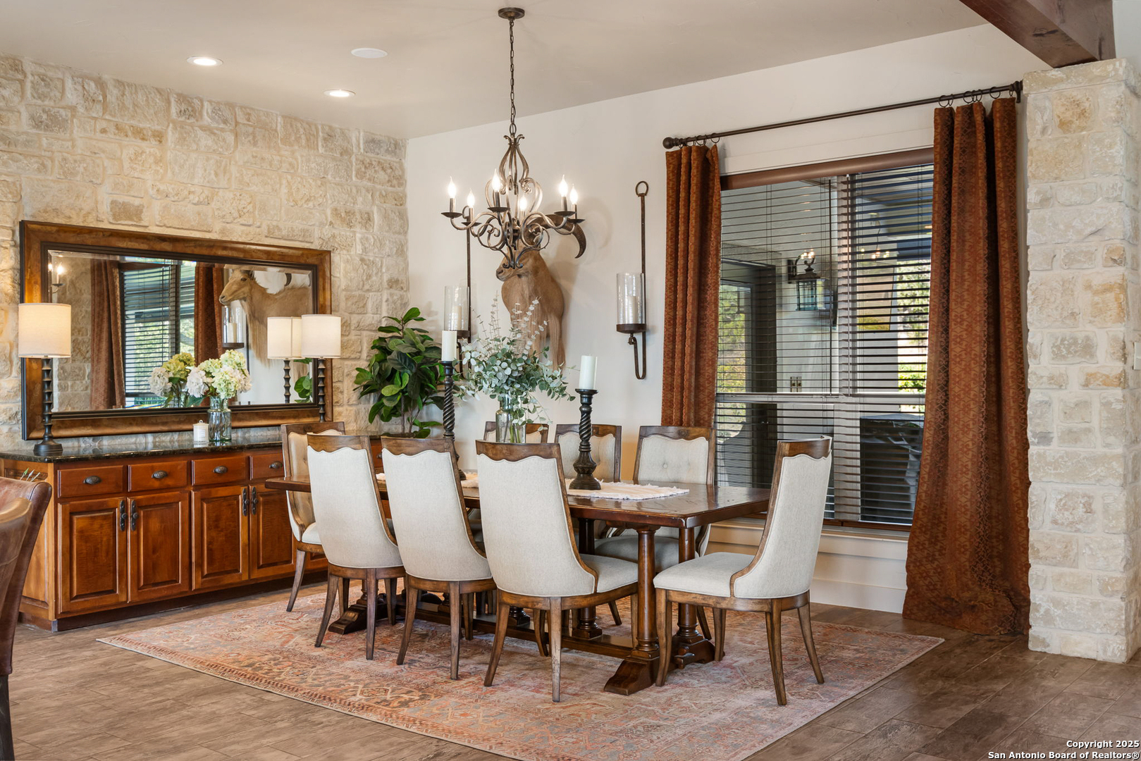 115 Spanish Pass Road Boerne, TX 78006 - Photo 13 of 50 a view of a dining room with furniture window and wooden floor