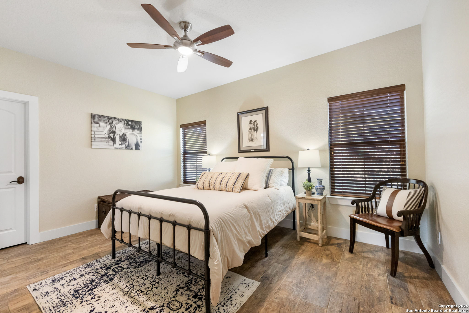 115 Spanish Pass Road Boerne, TX 78006 - Photo 24 of 50 a bedroom with a bed and a window