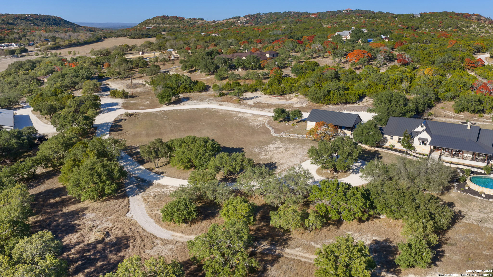 115 Spanish Pass Road Boerne, TX 78006 - Photo 3 of 50 an aerial view of residential house with outdoor space and mountain view