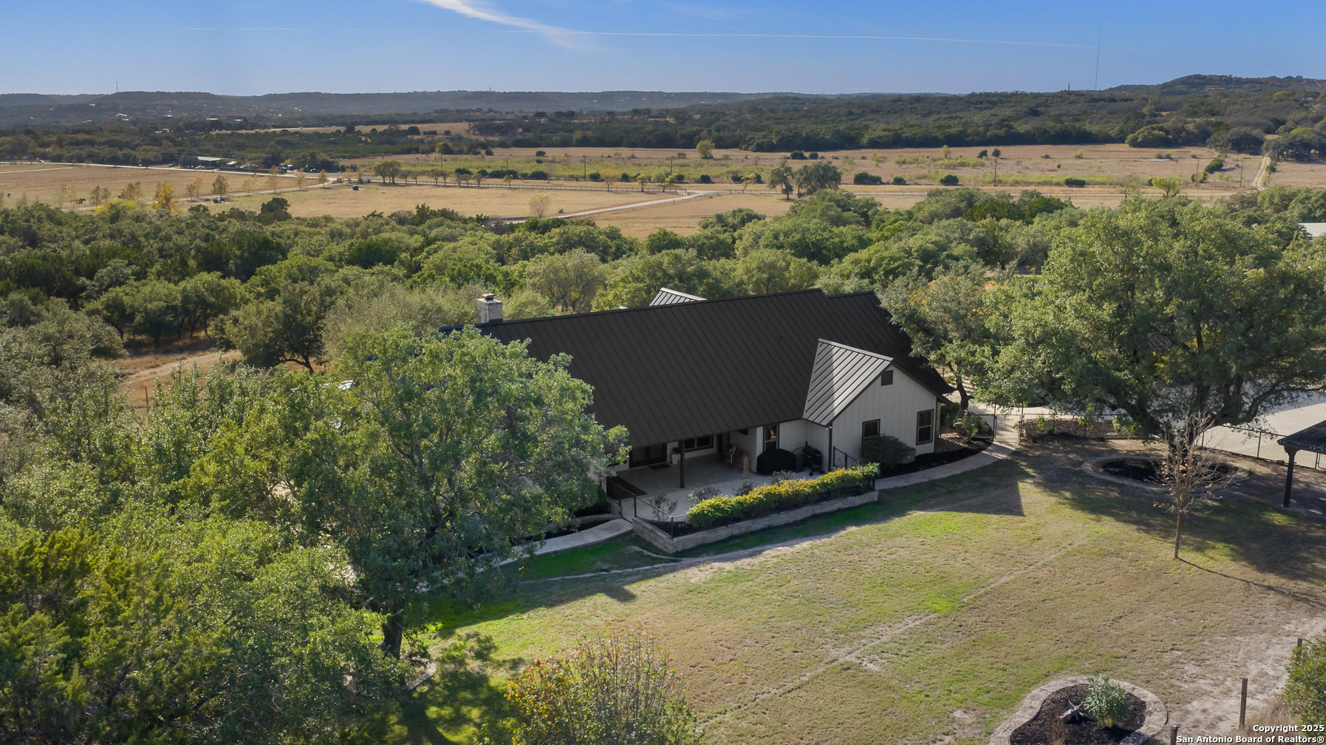 115 Spanish Pass Road Boerne, TX 78006 - Photo 38 of 50 a view of a lake with a mountain