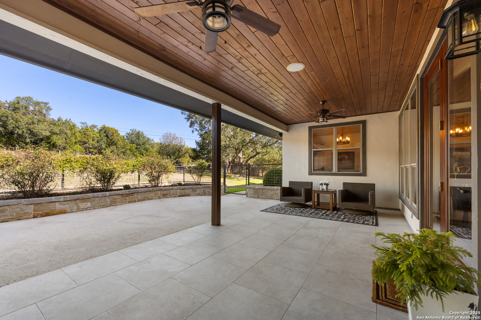 115 Spanish Pass Road Boerne, TX 78006 - Photo 39 of 50 a lobby with furniture and floor to ceiling window