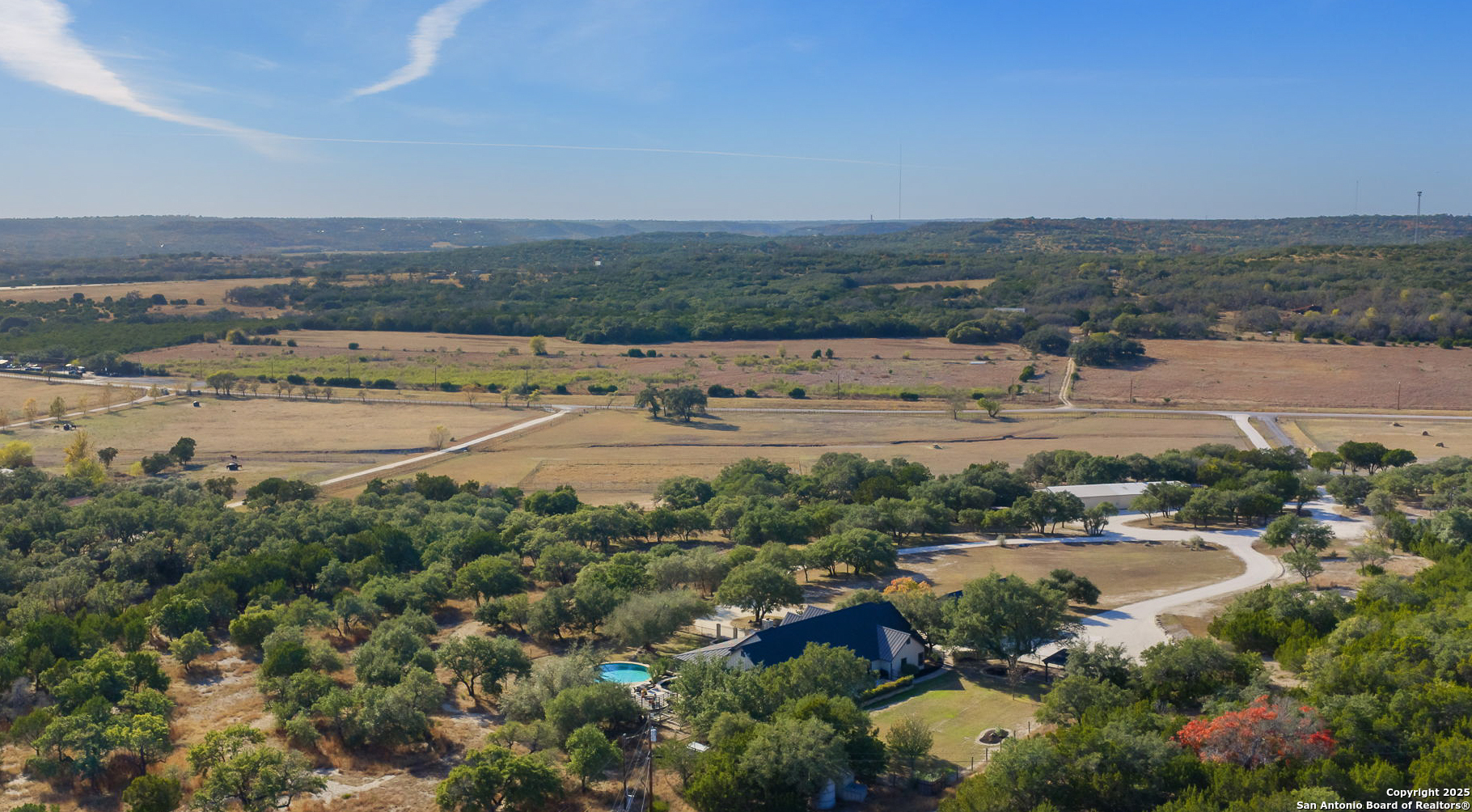 115 Spanish Pass Road Boerne, TX 78006 - Photo 43 of 50 an aerial view of ocean and residential houses with outdoor space