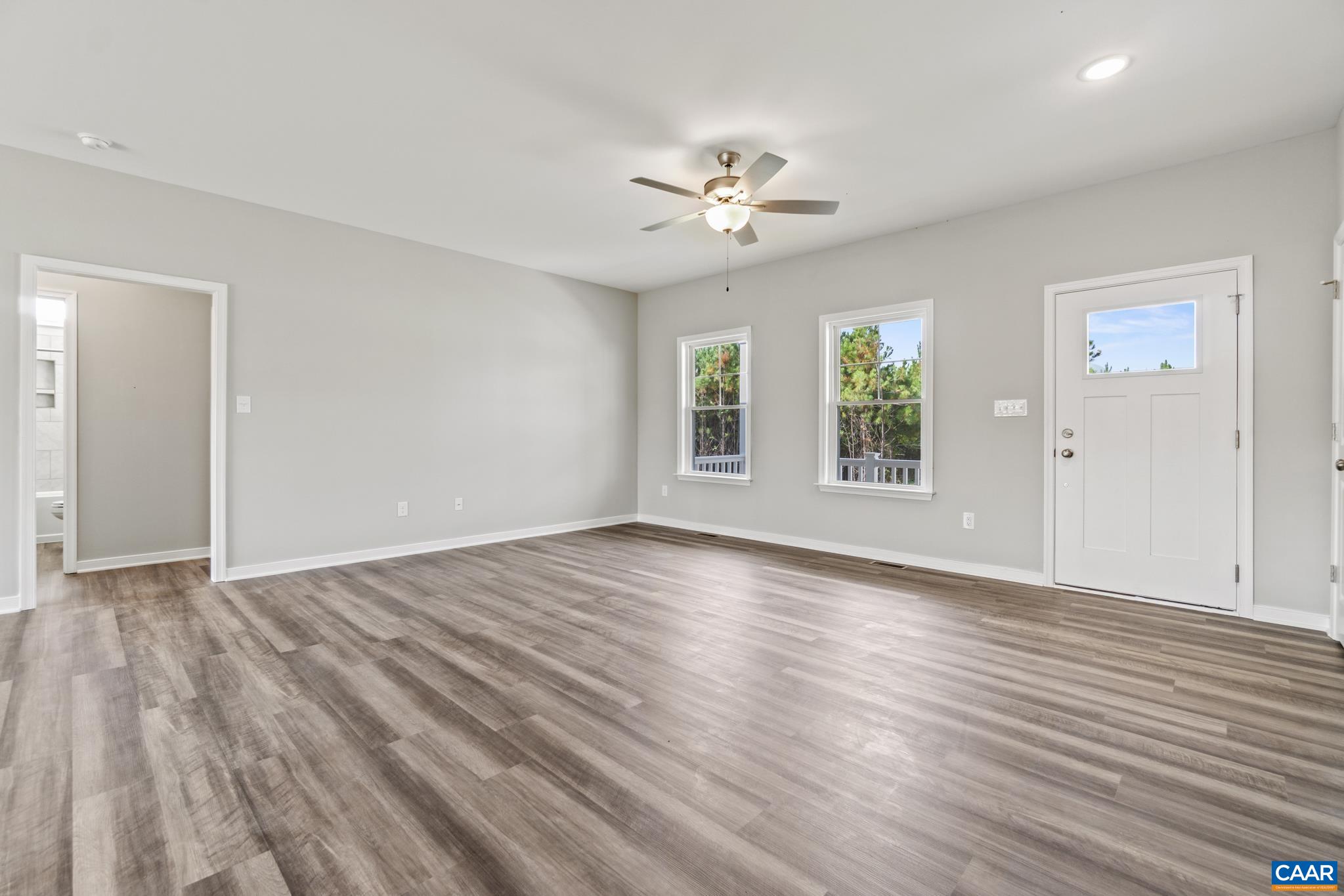 Lot 4 Hells Bend Road Palmyra, VA 22963 - Photo 3 of 21 a view of an empty room with wooden floor and a window