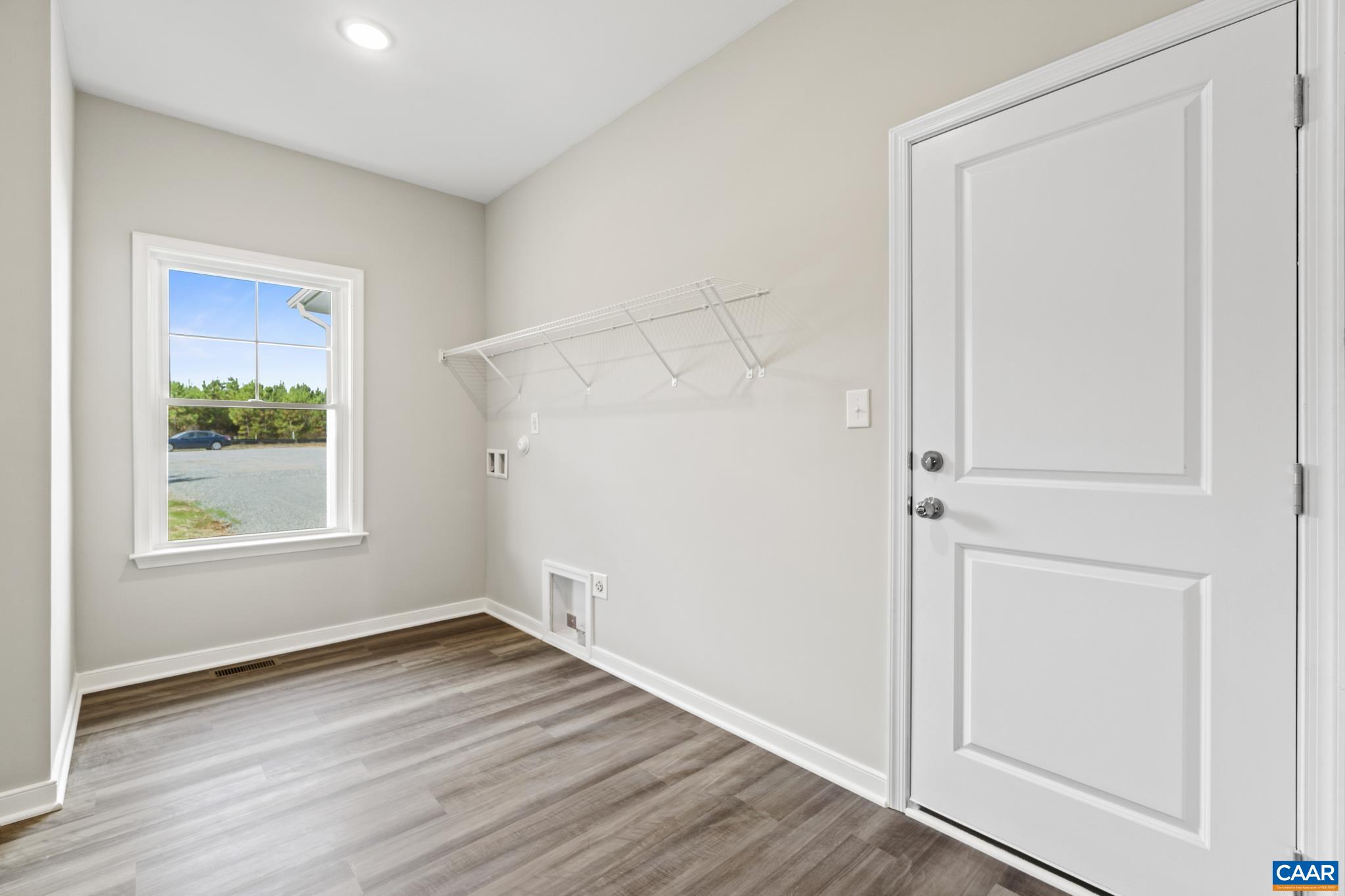 Lot 4 Hells Bend Road Palmyra, VA 22963 - Photo 10 of 21 an empty room with wooden floor closet and windows