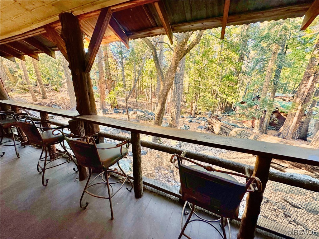 12 Barton Flats Road Angelus Oaks, CA 92305 - Photo 13 of 20 a view of a chairs and table in the outdoor