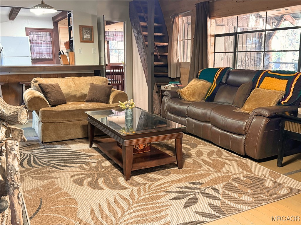 12 Barton Flats Road Angelus Oaks, CA 92305 - Photo 3 of 20 a living room with furniture and a couch